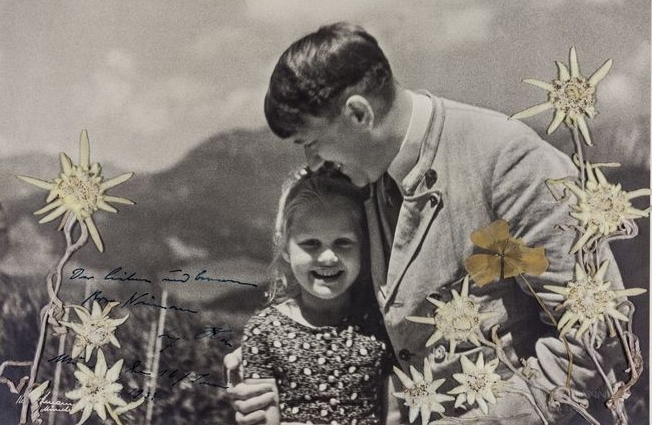 Неверојатната приказна зад фотографијата на Хитлер и мало девојче: Таа беше неговата миленичка (ФОТО)